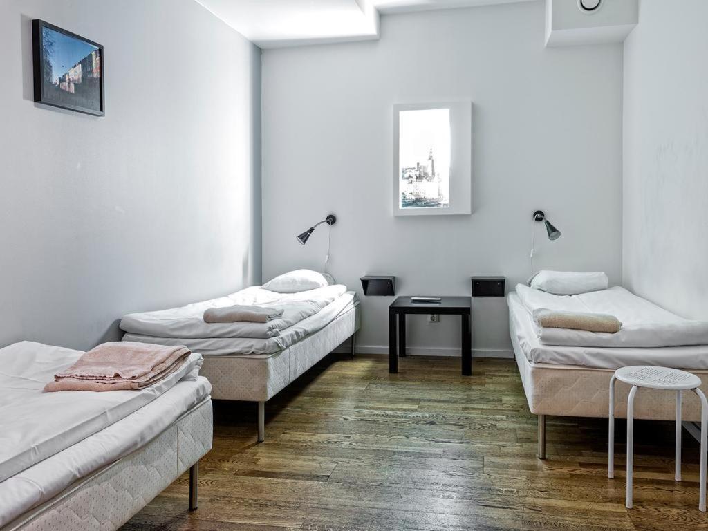 Triple Room with Shared Bathroom (No Windows)