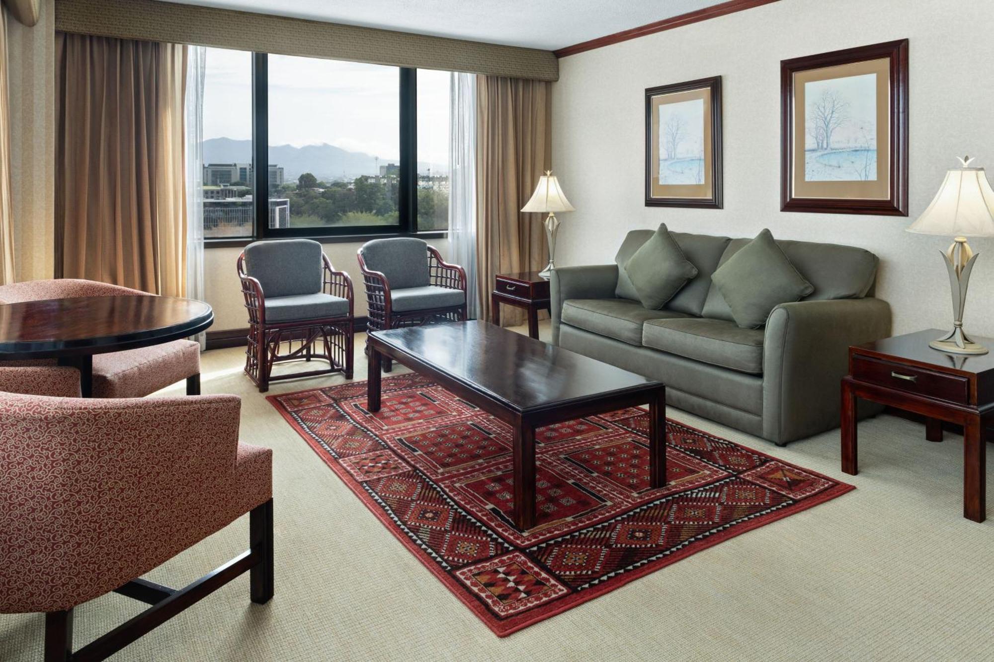 Standard Corner King Room with City View