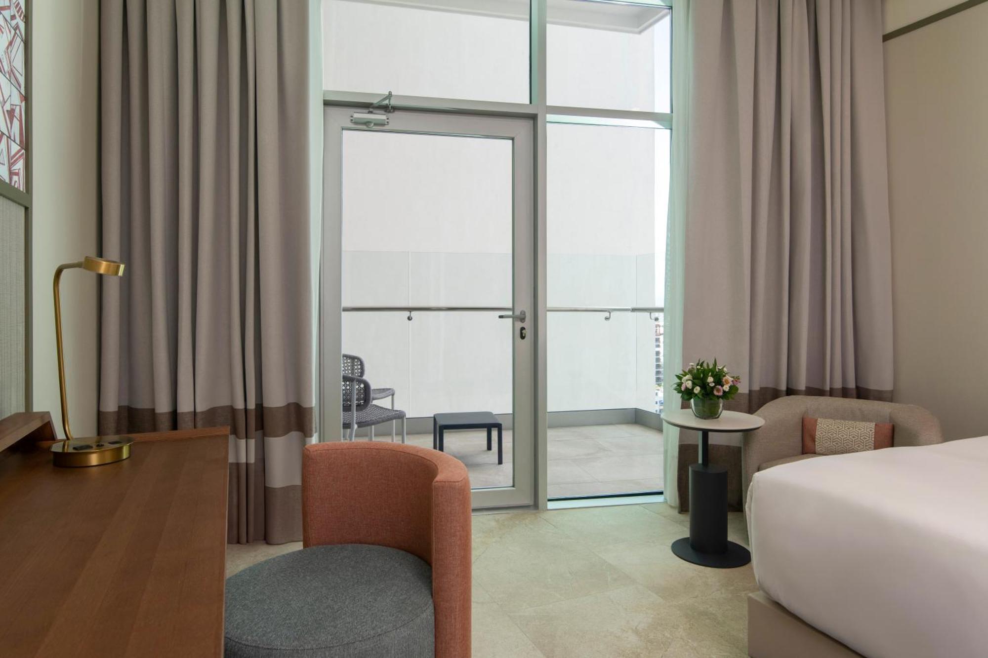 Deluxe Room with Two Double Beds and Balcony