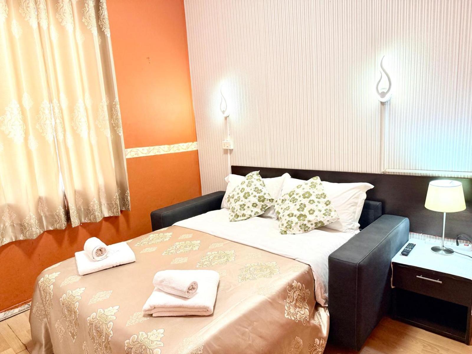 Quadruple Room with Shared Bathroom