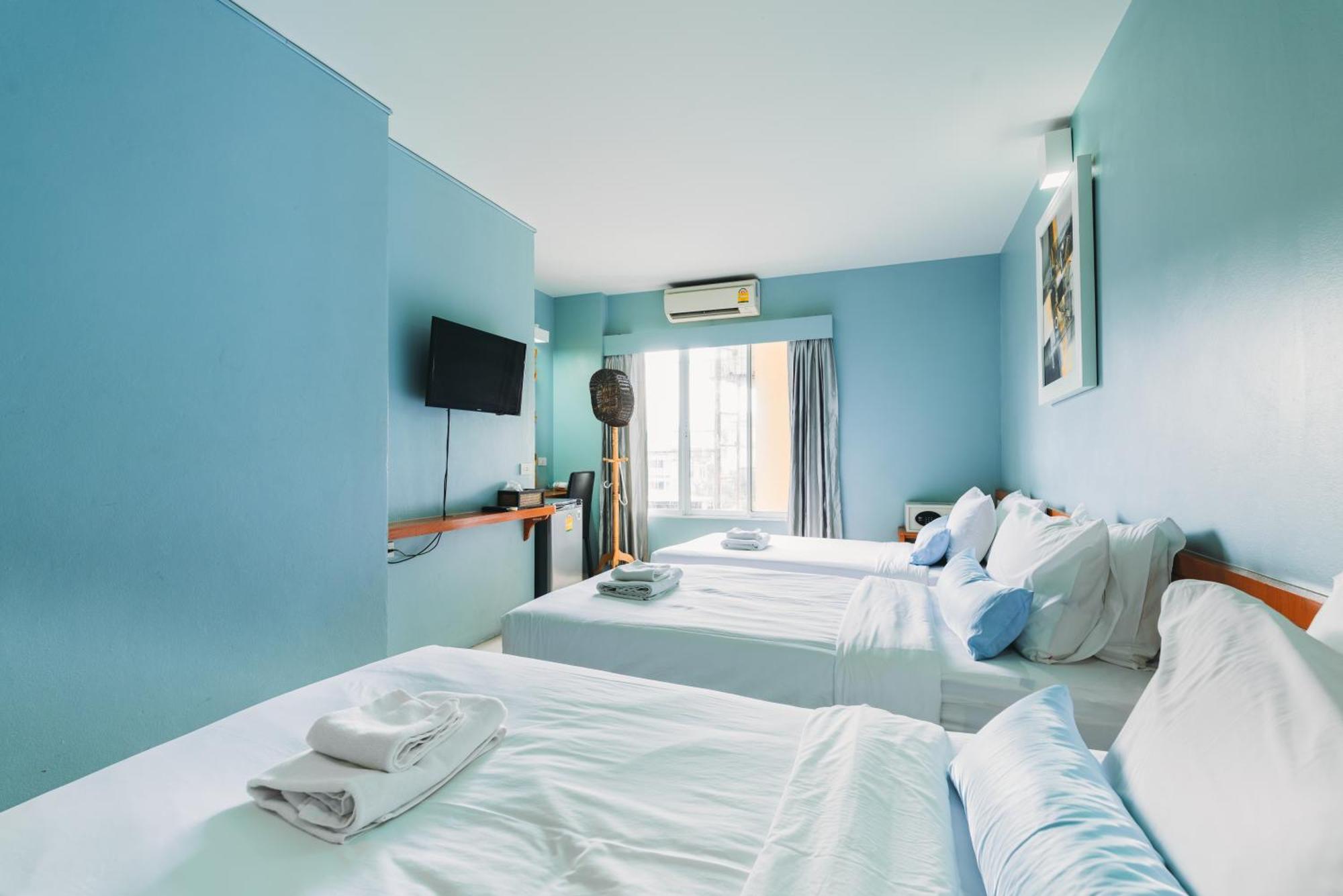 Deluxe Triple Room
