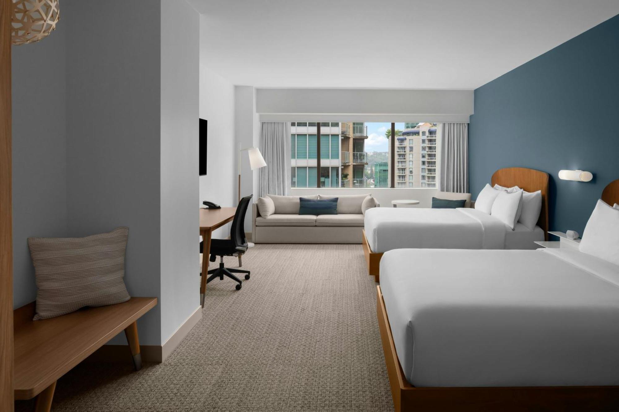 Queen Room with Two Queen Beds with Sofa Bed and River View