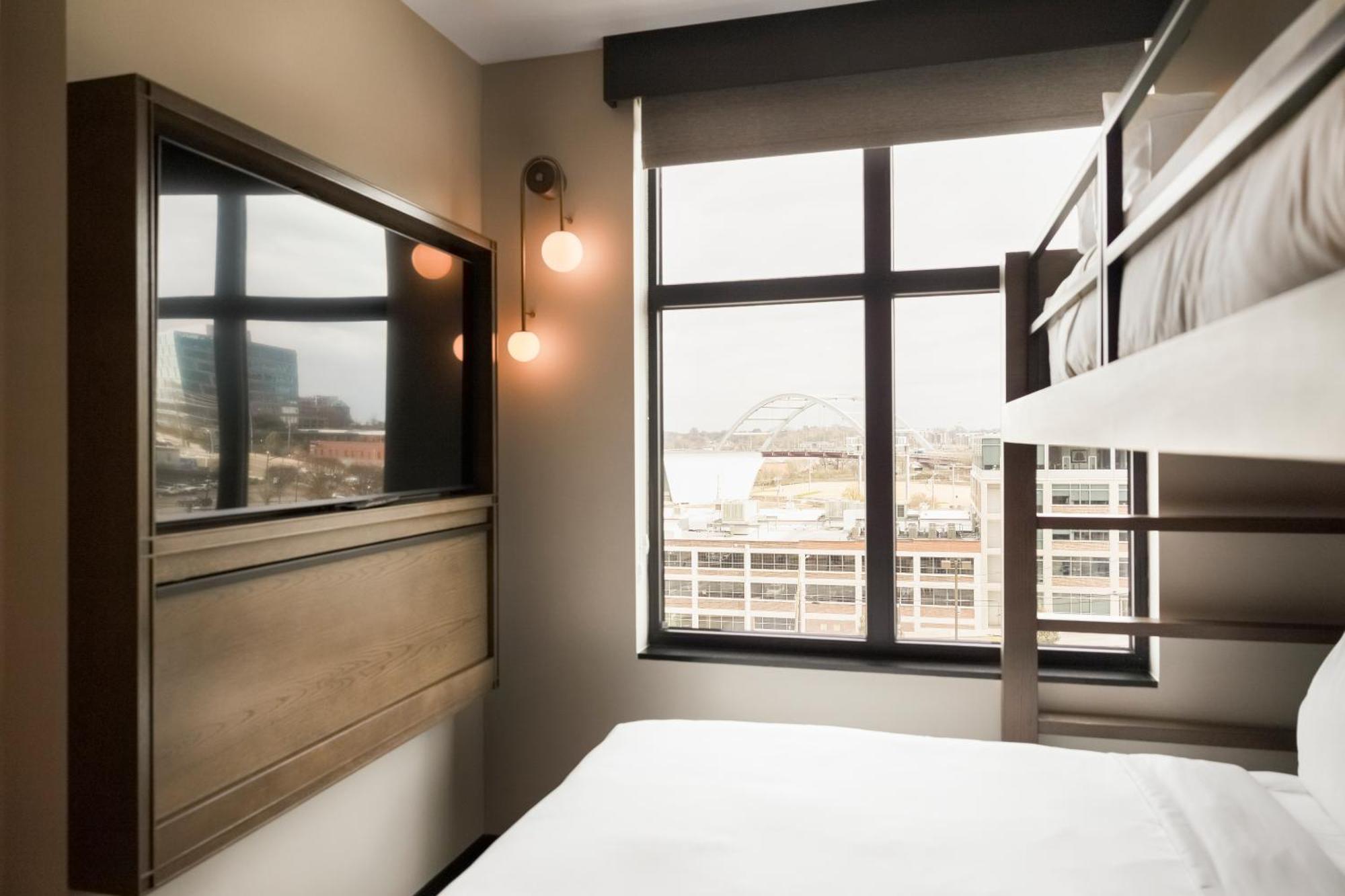 Room with One Twin Over Queen Bunk Bed