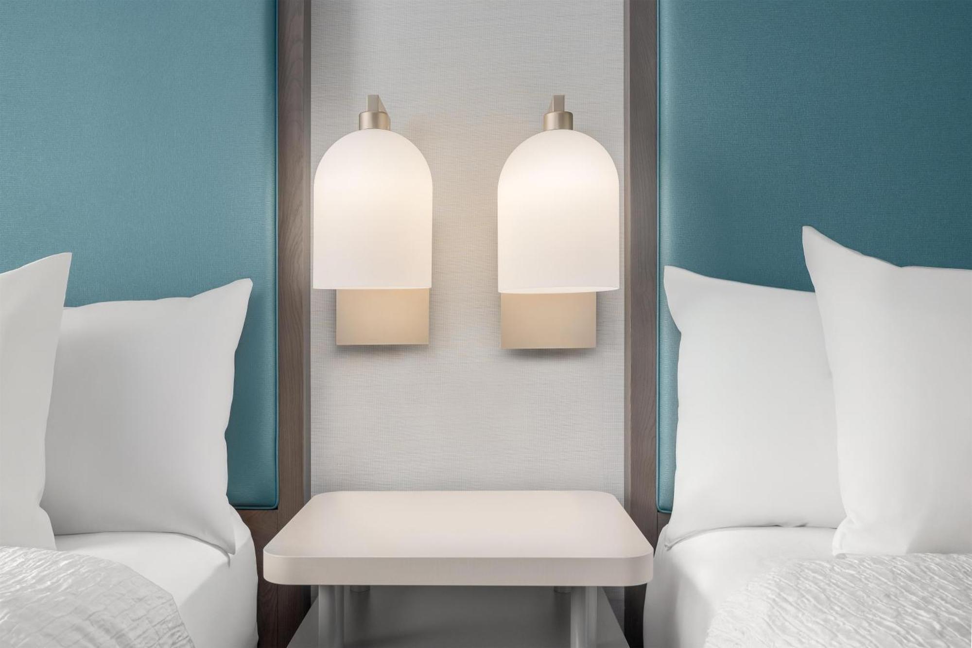Two Bedroom Suite with One King and Two Queen Beds - Non-Smoking