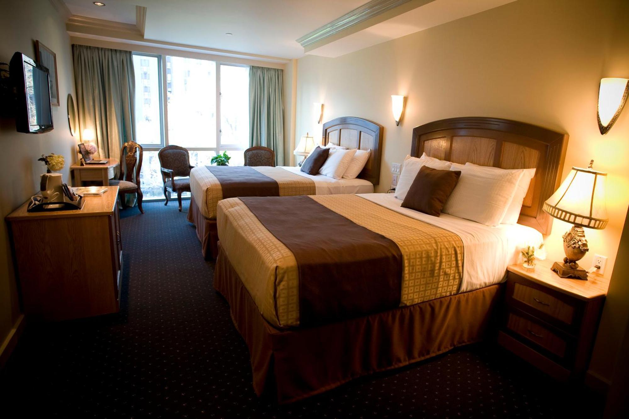 Deluxe Queen Room with Two Queen Beds City View