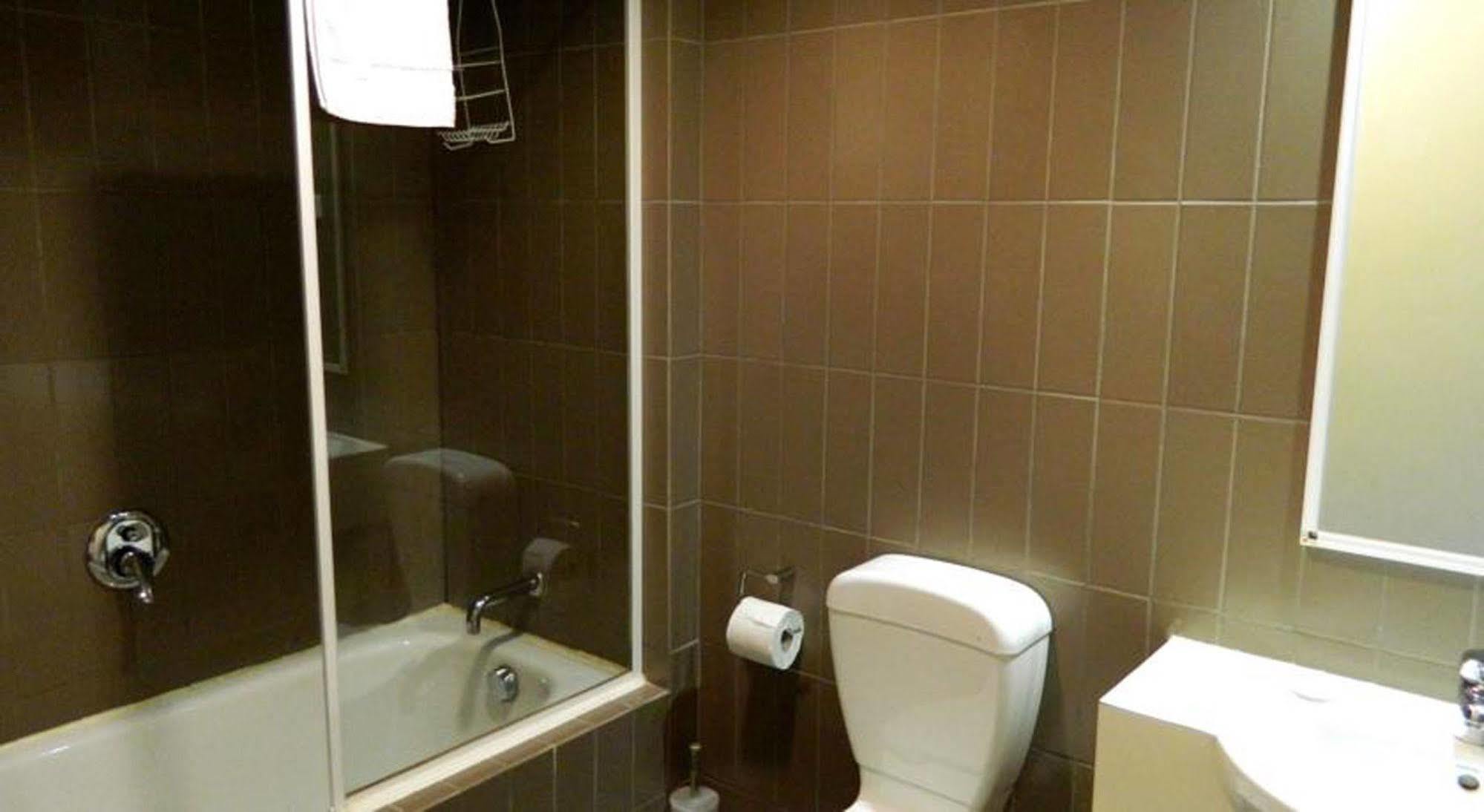 Bed in 4-Bed Dormitory Room with Private Bathroom