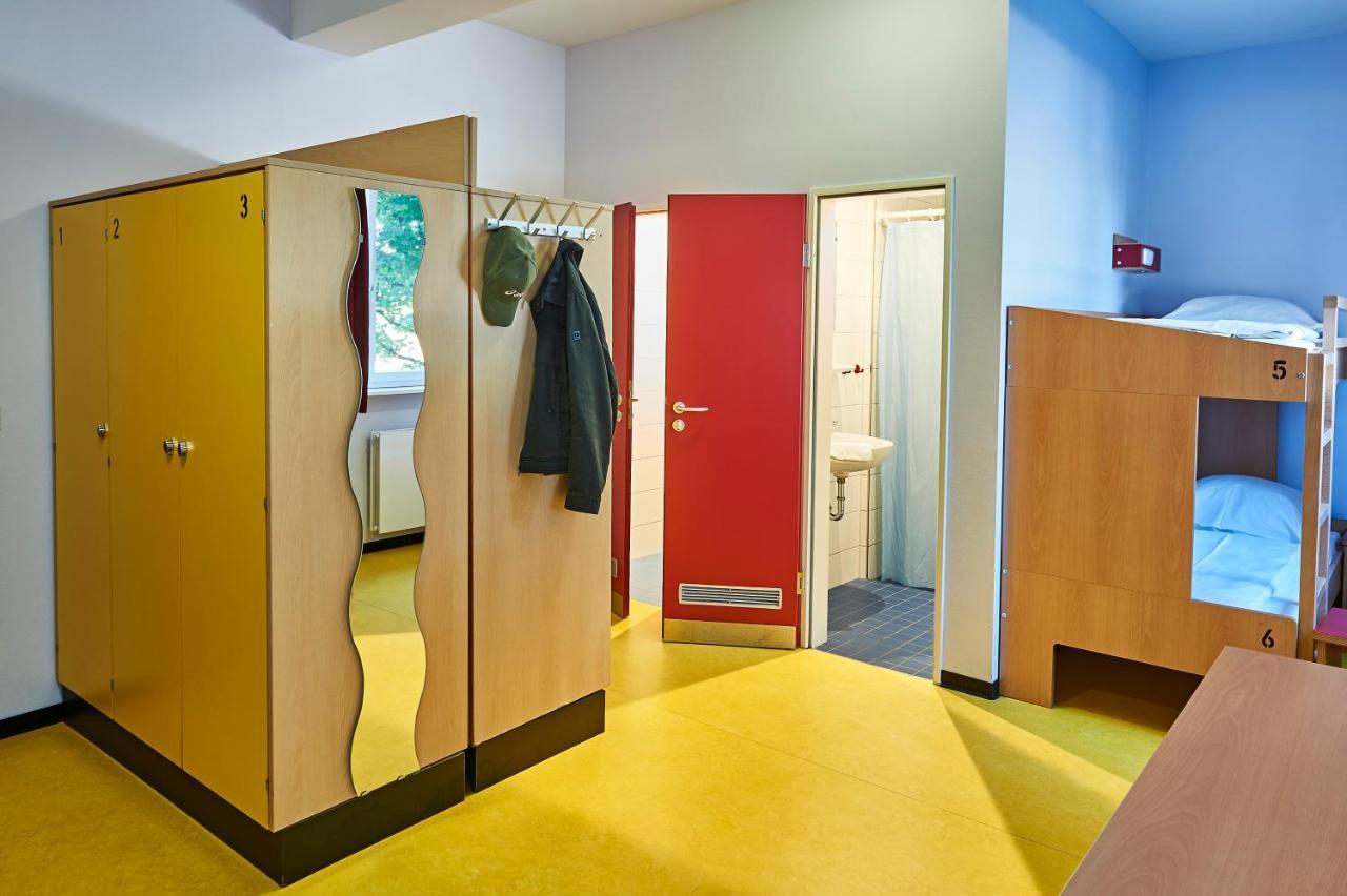 Bed in Male 4-Bed / 6-Bed Dormitory Room with Shower and Toilet