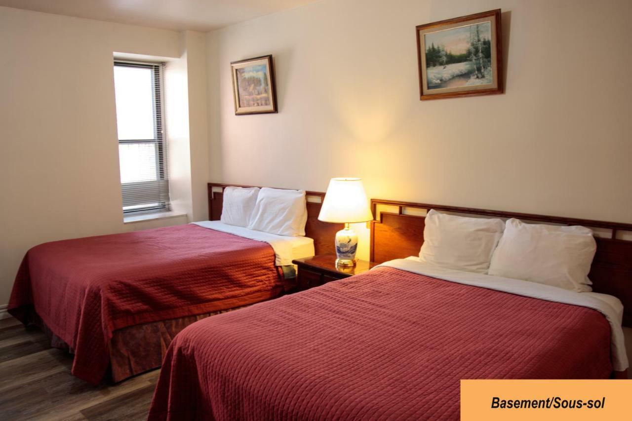 Economy Half Basement 2 Queen Bed Room,798912117:JPEG
